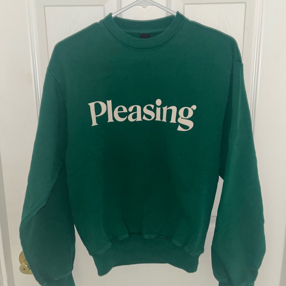 Dark green crew neck with cream writing, XS